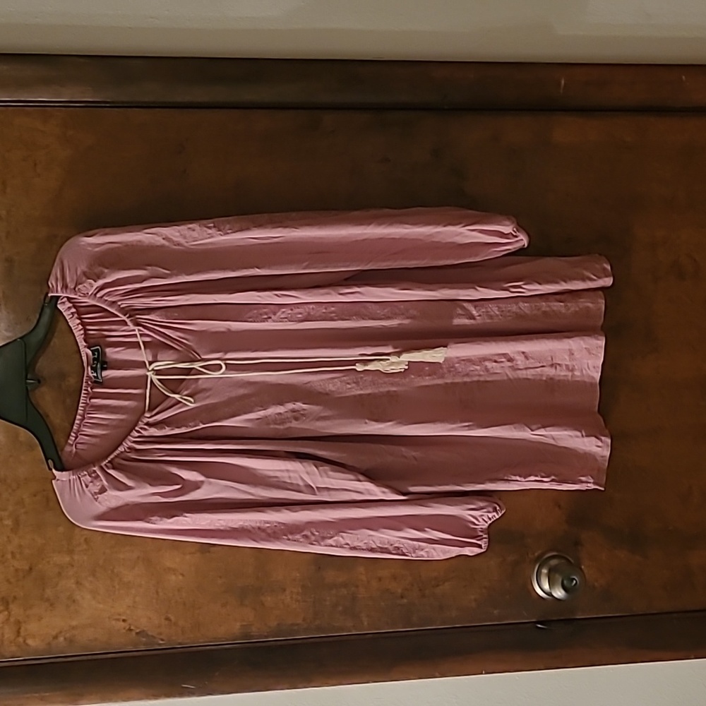 Muted pink tie front peasant blouse with  embroidered details.